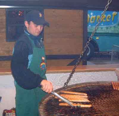 bar b queing of large German sausages.